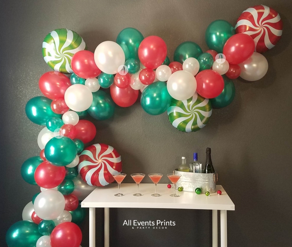 holiday balloon garland with peppermint balloons